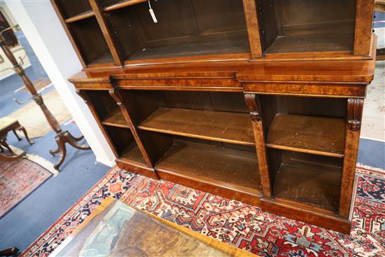 A Victorian figured walnut inverse breakfront library bookcase, W.6ft 1in. D.1ft 4in. H.7ft 6in.